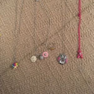 4 Necklaces and 1 Ring